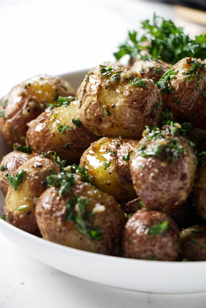 Roasted baby potatoes in a bowl.