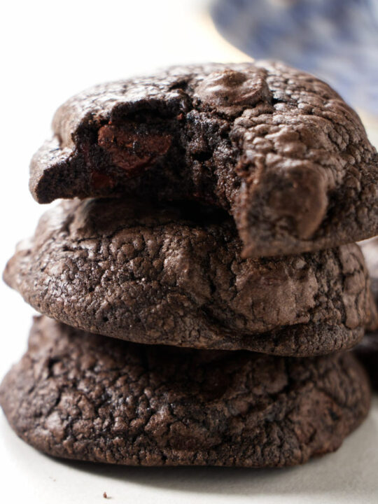 A stack of black cocoa cookies.