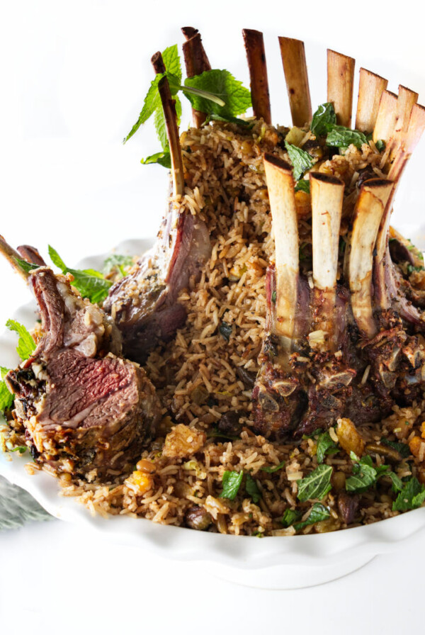 A crown rack of lamb with two ribs sliced off.