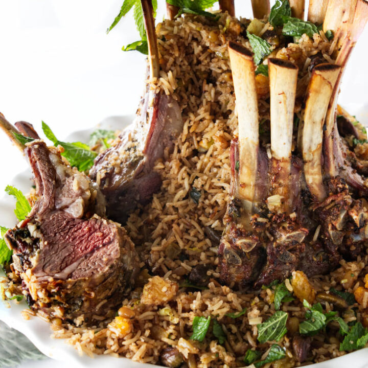 A crown rack of lamb with two ribs sliced off.