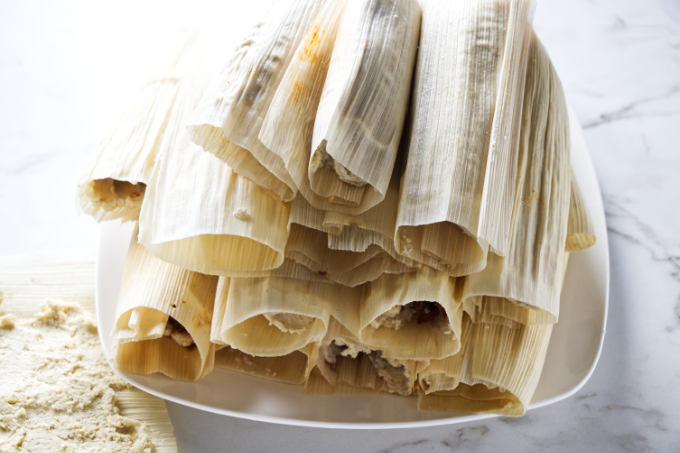 A stack of tamales ready for the steamer.