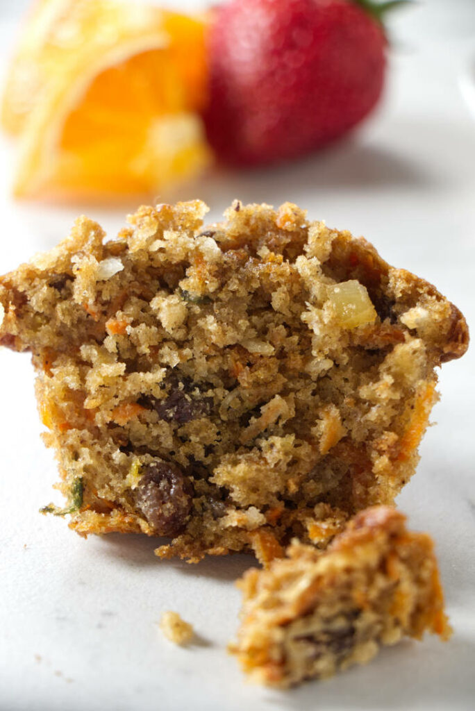 A morning glory muffin sliced in half.