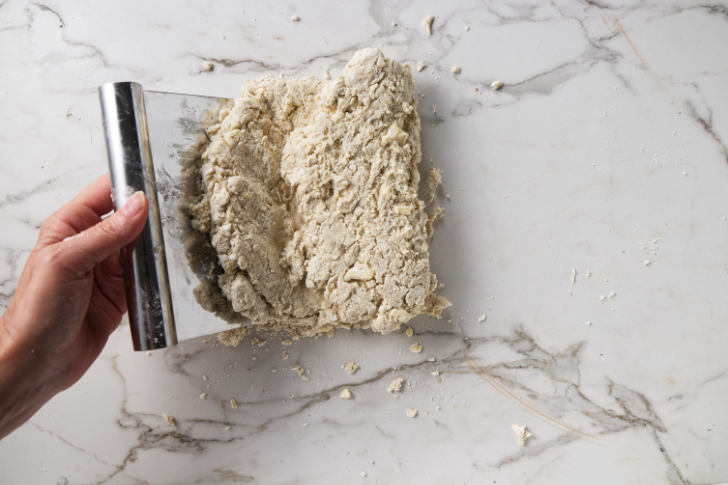 Folding biscuit dough to create layers