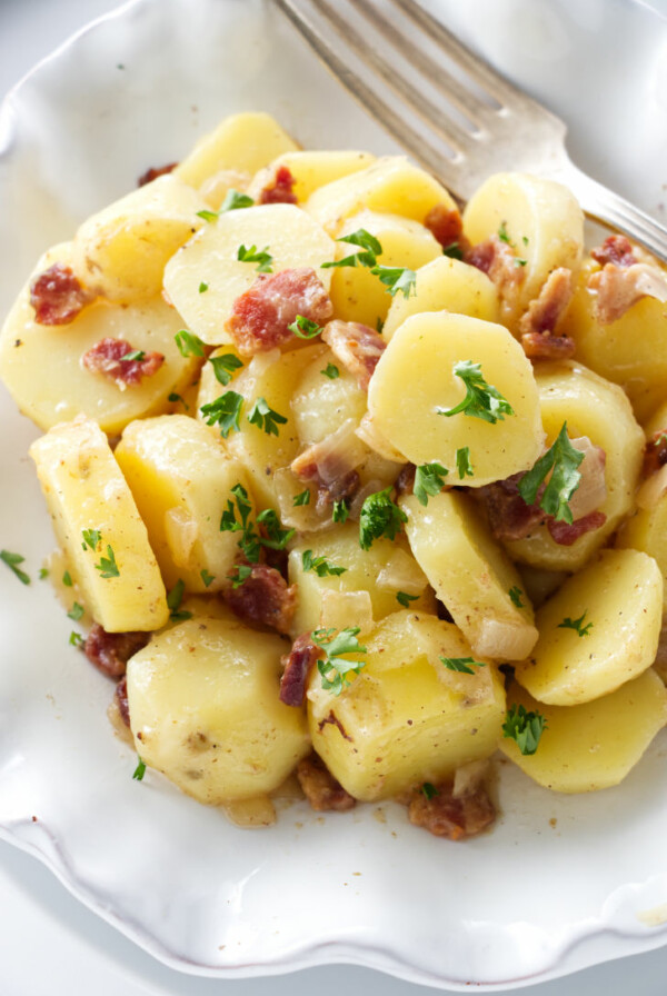 Warm potato salad on a plate.