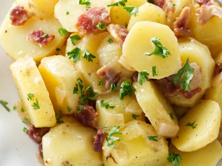 Warm potato salad on a plate.