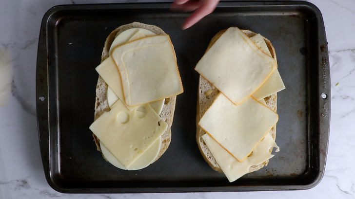 Melting cheese on sandwich bread.
