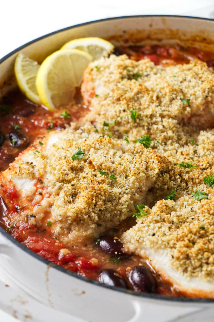 Baked halibut in tomato sauce.