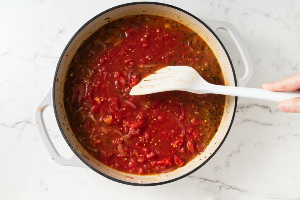 Mediterranean tomato sauce in a skillet.