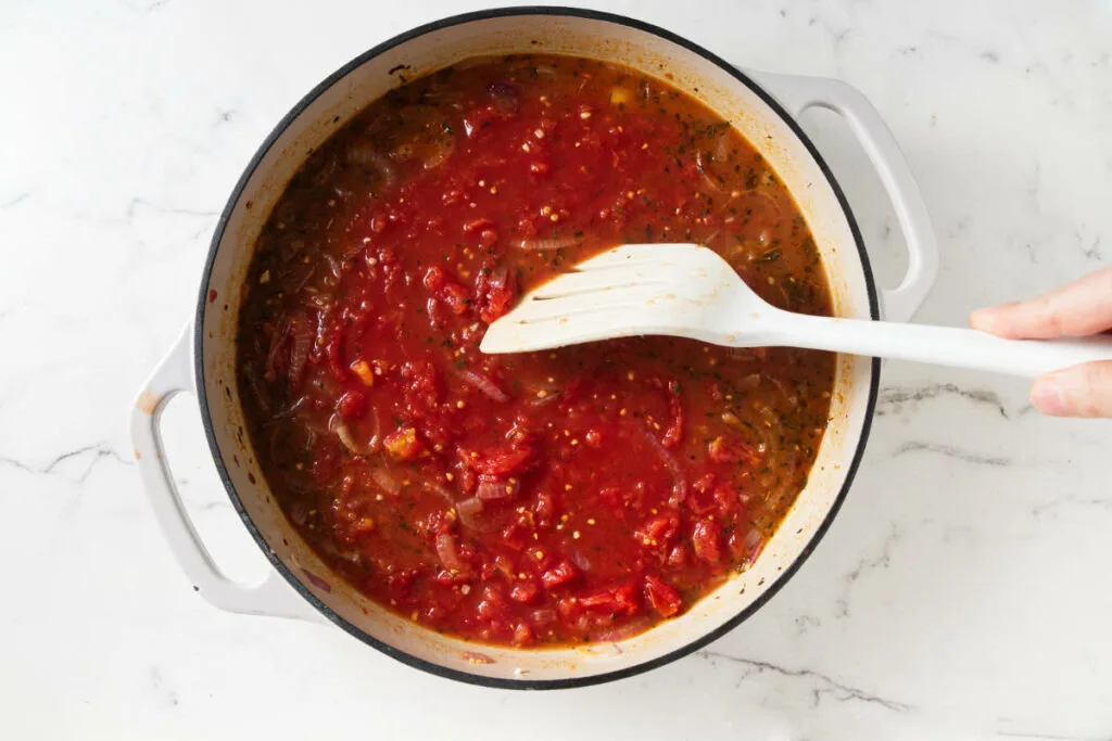 Mediterranean tomato sauce in a skillet.