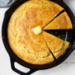 Butter melting on top of cornbread.