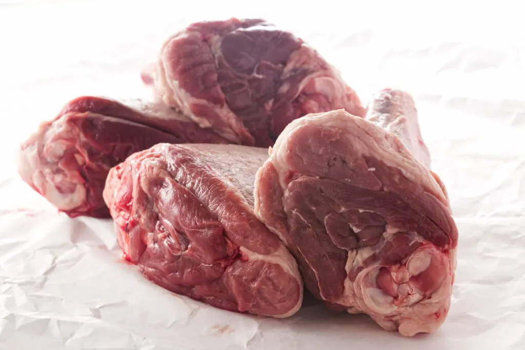 4 uncooked meaty lamb shanks