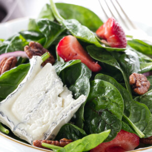 Close up view of a serving of Strawberry Spinach Salad