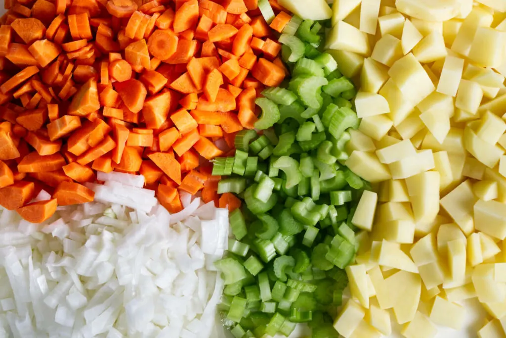 Diced carrots, onions, celery, and potatoes.