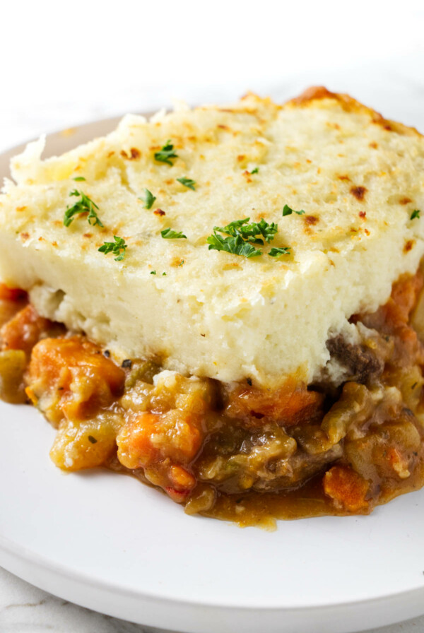 A slice of shepherd's pie on a plate.