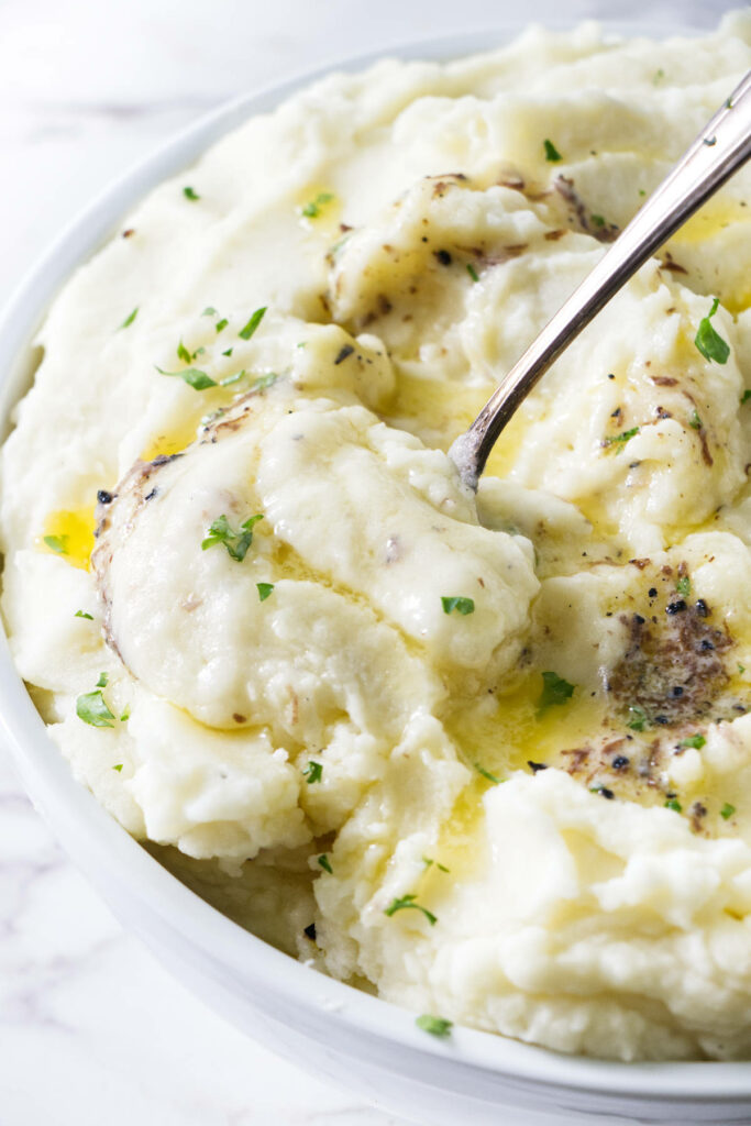Truffle butter melting into mashed potatoes.