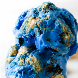 Chunks of cookies blended into blue ice cream.