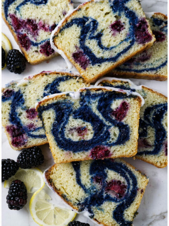 Slices of sweet bread swirled with blackberry ripples.