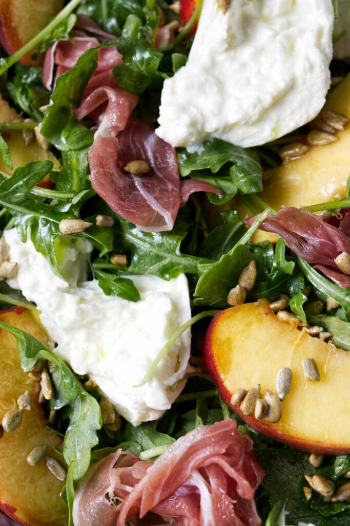 A closeup of an arugula salad.