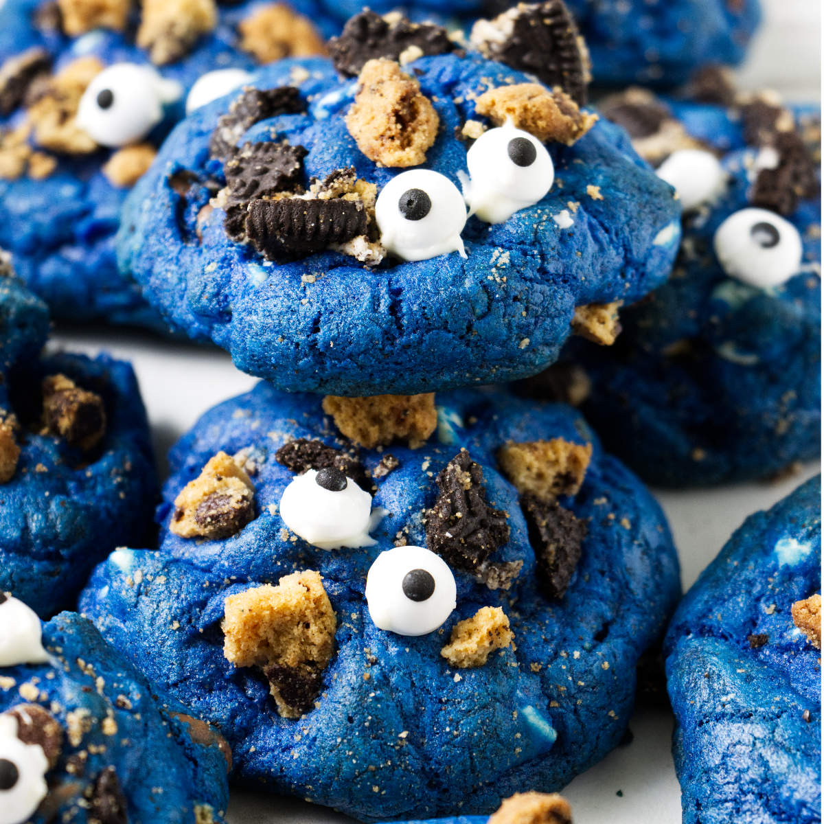 Blue cookies with candy eyeballs.