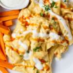 Buffalo pasta on a dinner plate.