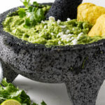 Guacamole in a molcajete.