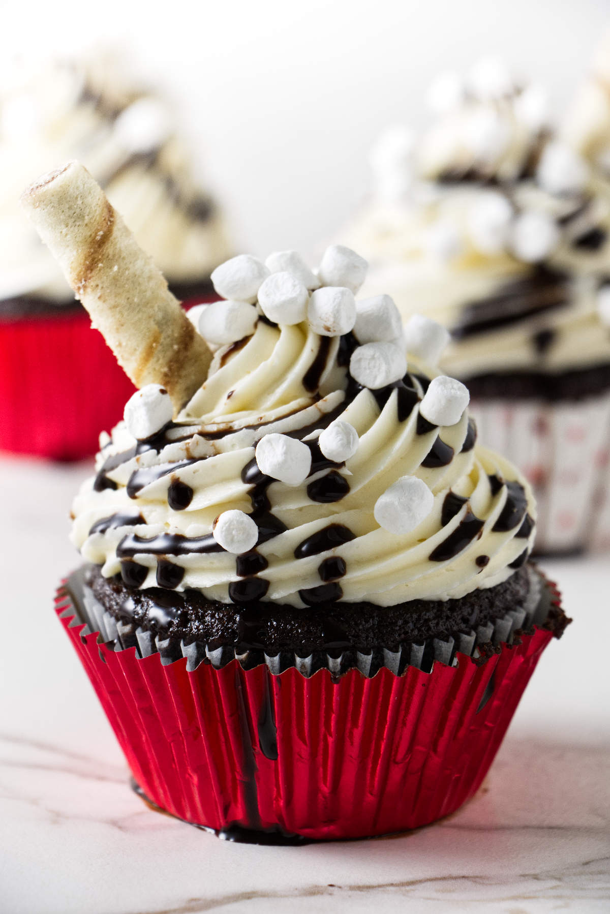 A chocolate cupcake with marshmallow buttercream.