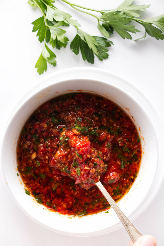 overhead view of a dish of red chimichurri