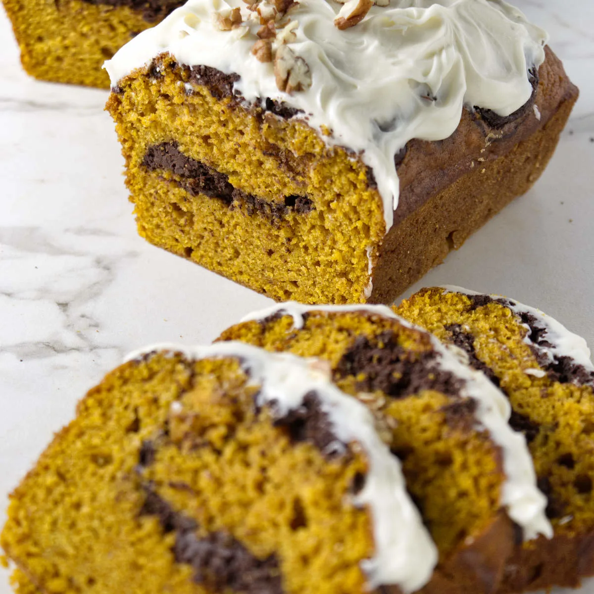 Pumpkin loaf with cream cheese frosting.
