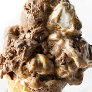 Chocolate marshmallow ice cream on a sugar cone.
