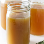 Chicken bone broth in mason jars.