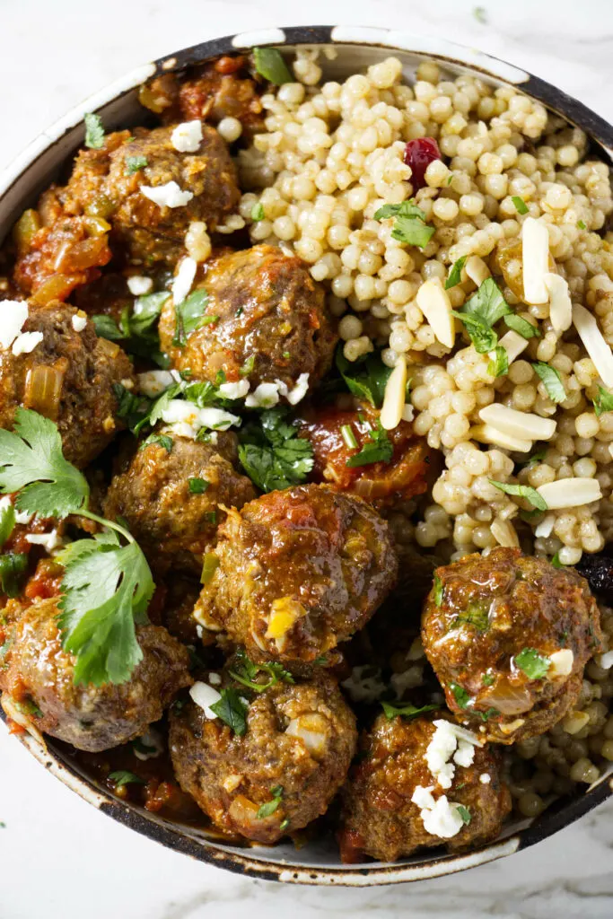 Moroccan lamb meatballs in a bowl with orzo.