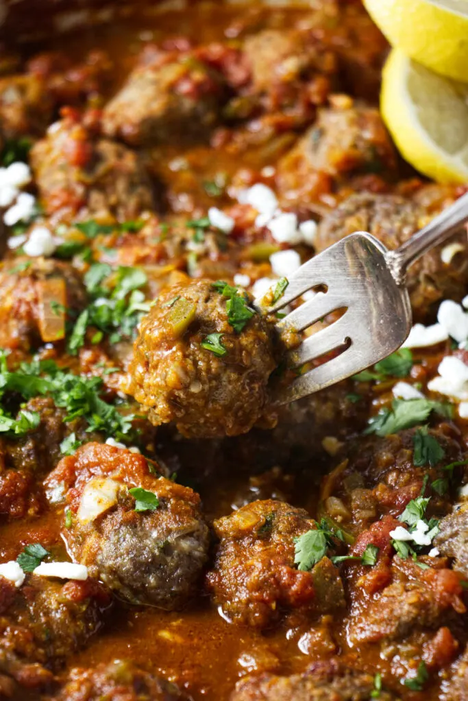 A meatball on a fork.