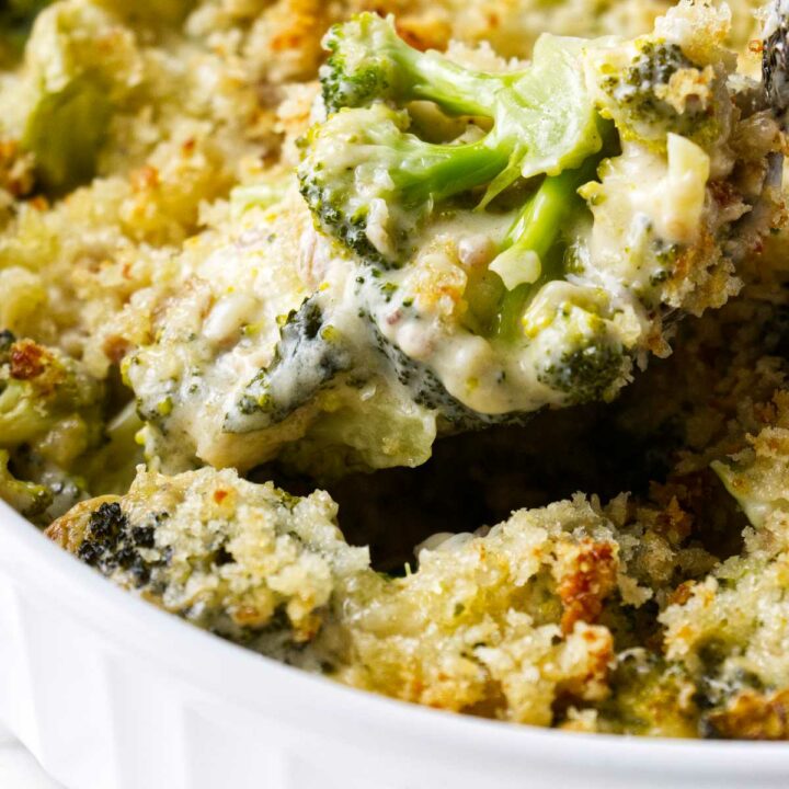 A serving of creamy broccoli casserole with cream cheese.