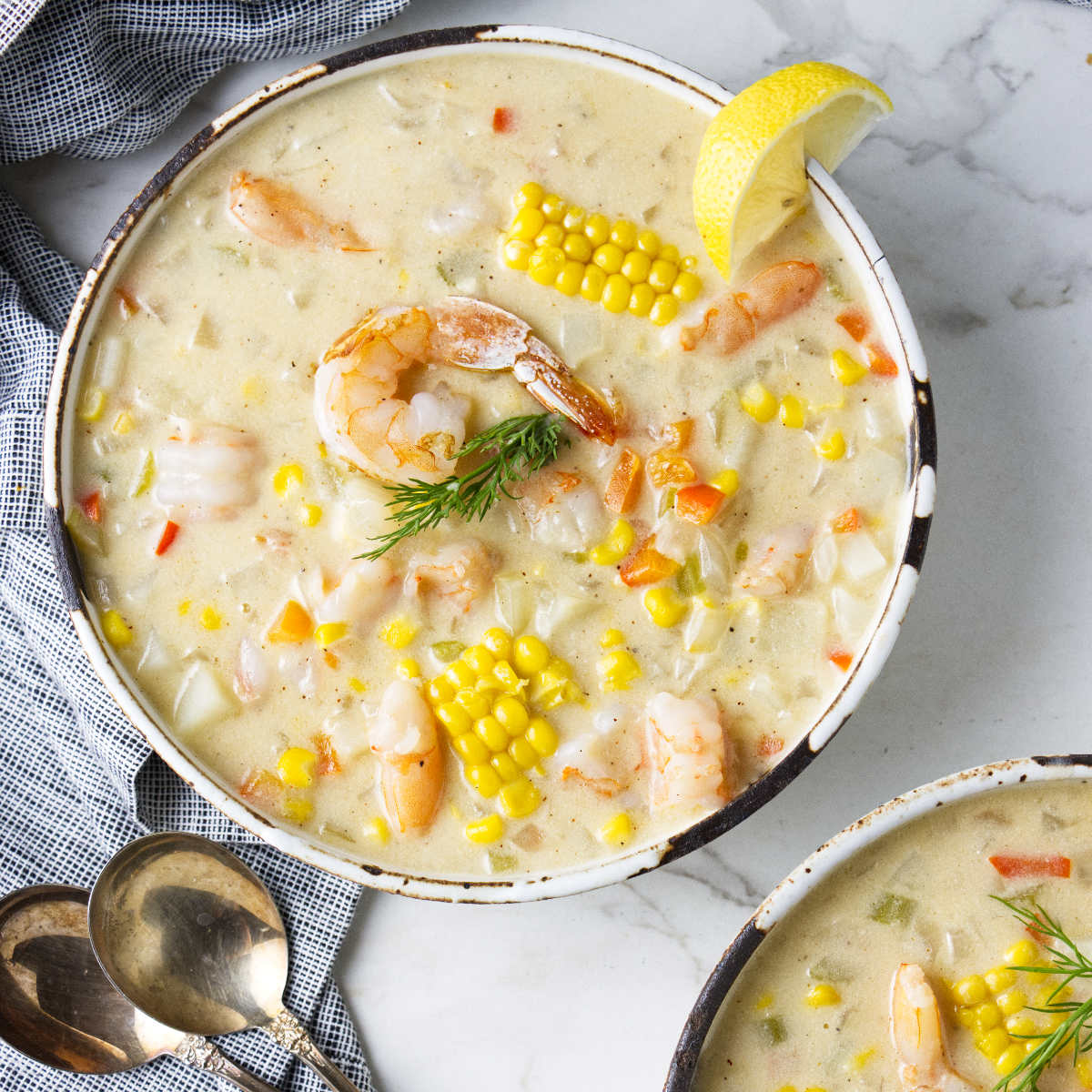 Shrimp and corn bisque in a bowl.
