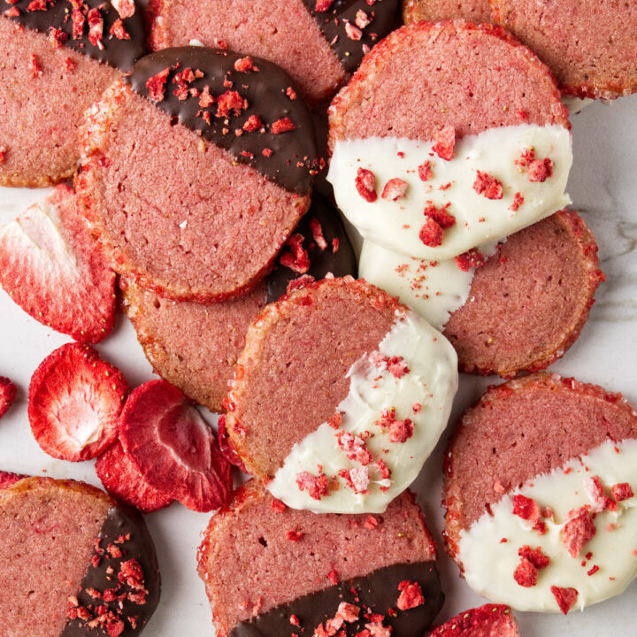 Strawberry shortbread cookies dipped in white and dark chocolate.