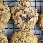 Einkorn chocolate chip cookies cooling on a cookie rack.