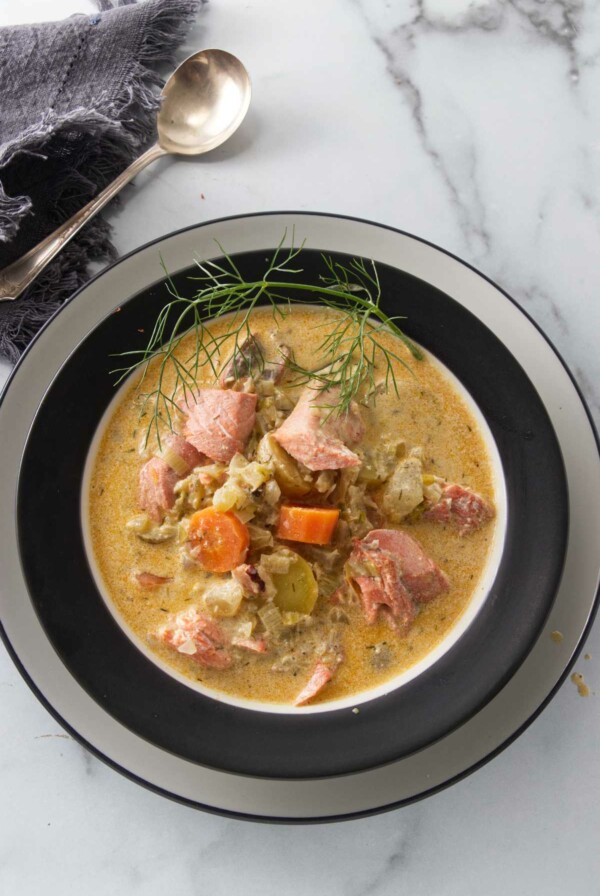 Overhead view of a dish of salmon stew.