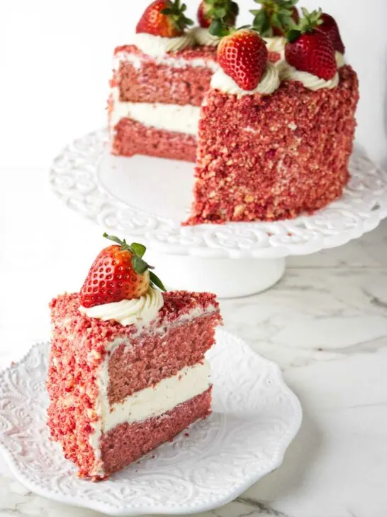 A strawberry cake with strawberry crumble coating the outside.