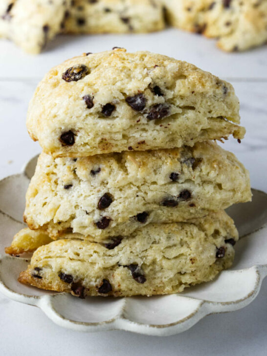 Three sourdough scones with chocolate chips and raisins.