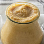 Homemade apple curd in a jar.