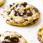 Egg yolk chocolate chip cookies on a baking sheet.