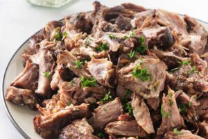 Oxtail meat shred off the bones.
