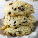 Three sourdough scones on a white plate.