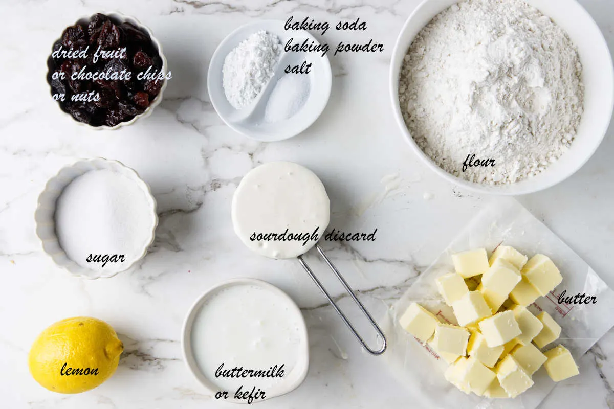 Flour, sourdough starter, baking powder, baking soda, butter, buttermilk, lemon sugar, chocolate chips, and raisins.