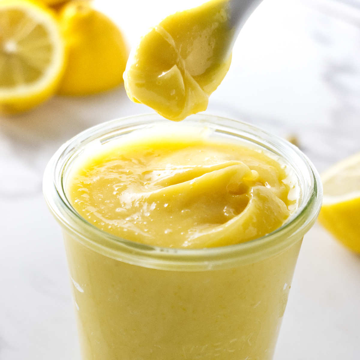 Lemon curd made with egg yolks only is thick and clinging to a spoon.
