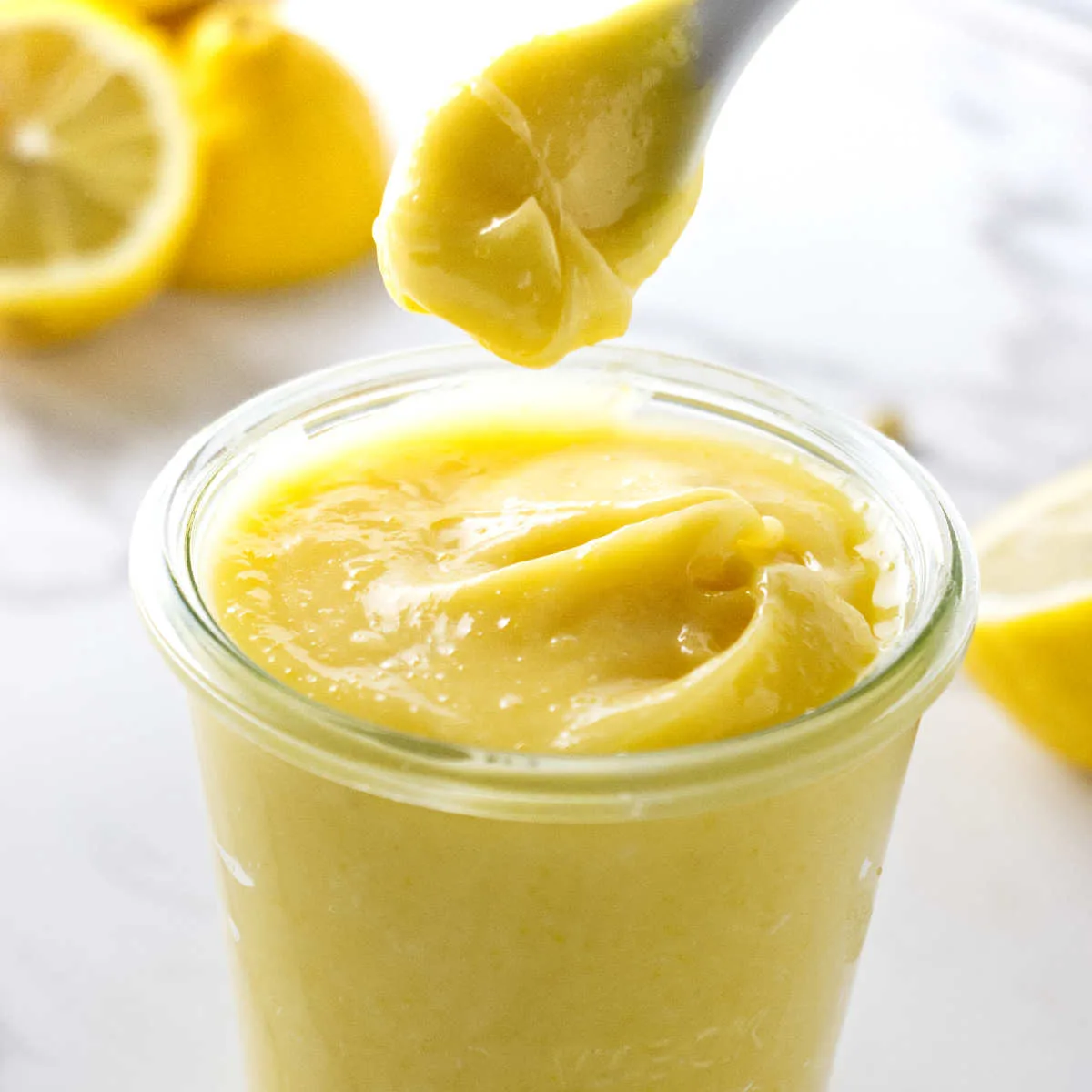 Lemon curd made with egg yolks only is thick and clinging to a spoon.