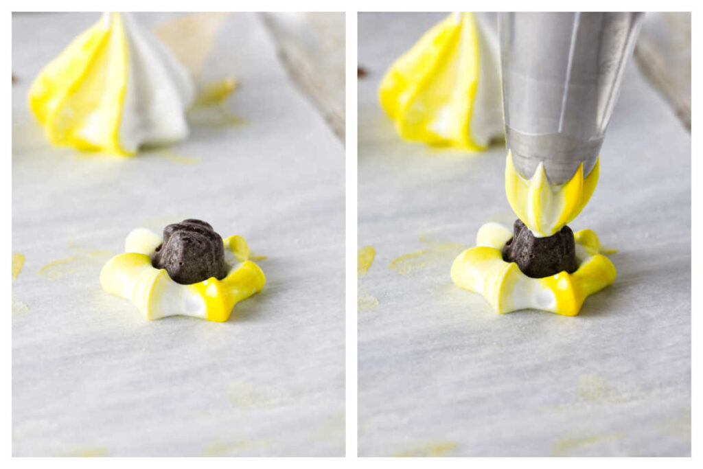 Adding a mini chocolate truffle inside a lemon meringue.