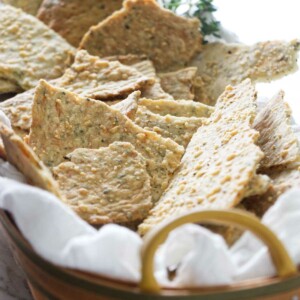 A basket filled with homemade sourdough crackers.