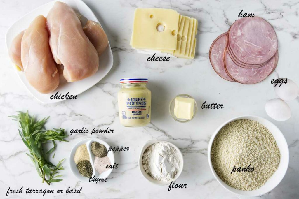 Ingredients for chicken cordon blue: chicken, cheese, ham, eggs, panko, blour, butter, Dijon, tarragon, pepper, salt, thyme, and garlic.