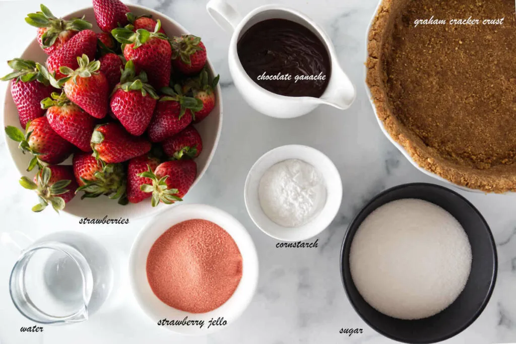 Substances: chocolate ganache, strawberries, jello, cornstarch, sugar, graham cracker crust.